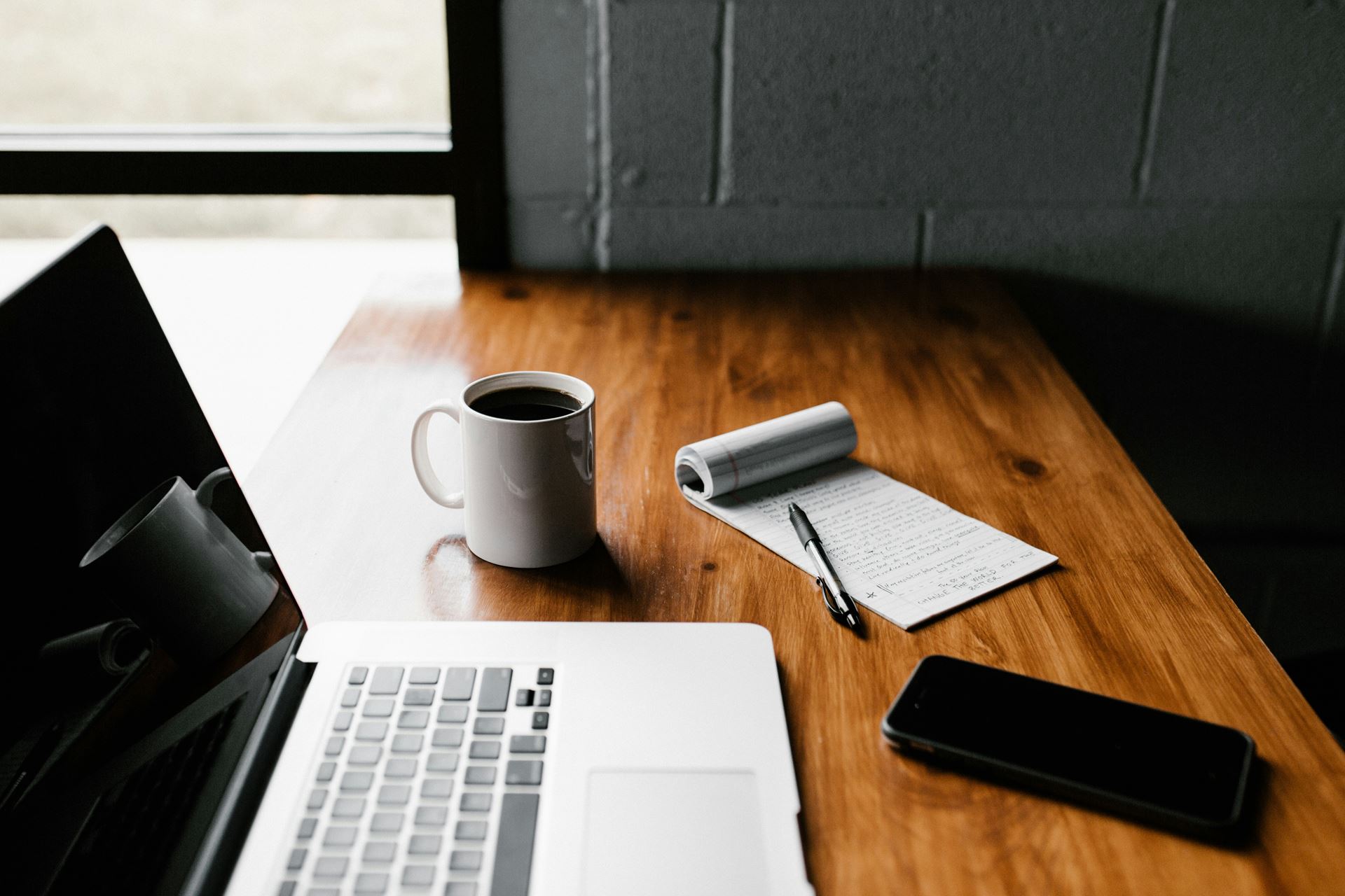laptop, coffee and notepad